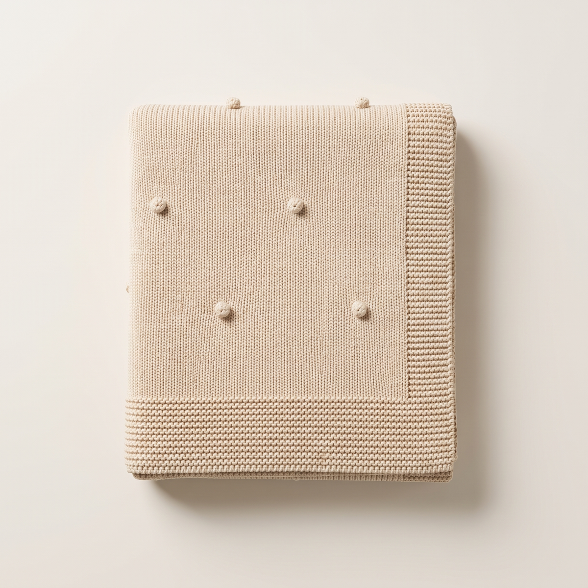 Babydecke aus Baumwolle im Popcornstrick in Sand – gestrickte Kuscheldecke für Babys